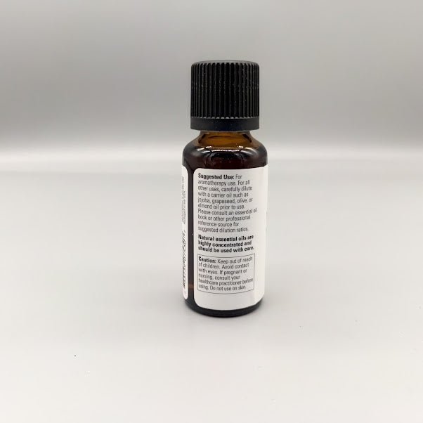 Aceite esencial de canela - 100% Pure - Cinnamon Cassia - 1oz de Now Essential Oils — vista posterior del envase (foto de archivo)