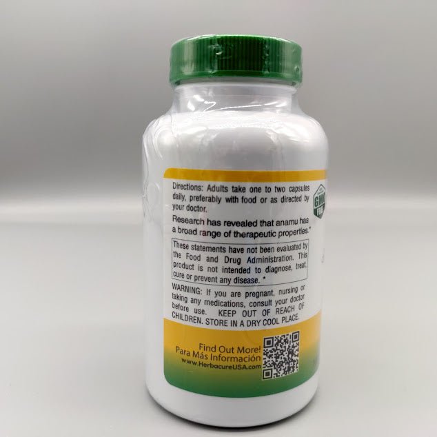 Anamú Herbacure 625 mg 100 cápsulas, Petiveria alliacea en hoja — vista posterior del envase (foto de archivo)