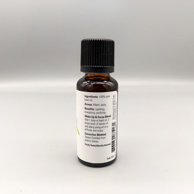 Aceite esencial de albahaca NOW 100% puro Ocimum basilicum 1 oz — etiqueta con los ingredientes
