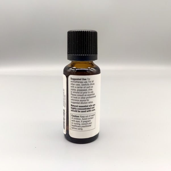Aceite esencial de jengibre NOW 100% puro Zingiber officinale 1 oz — vista posterior del envase