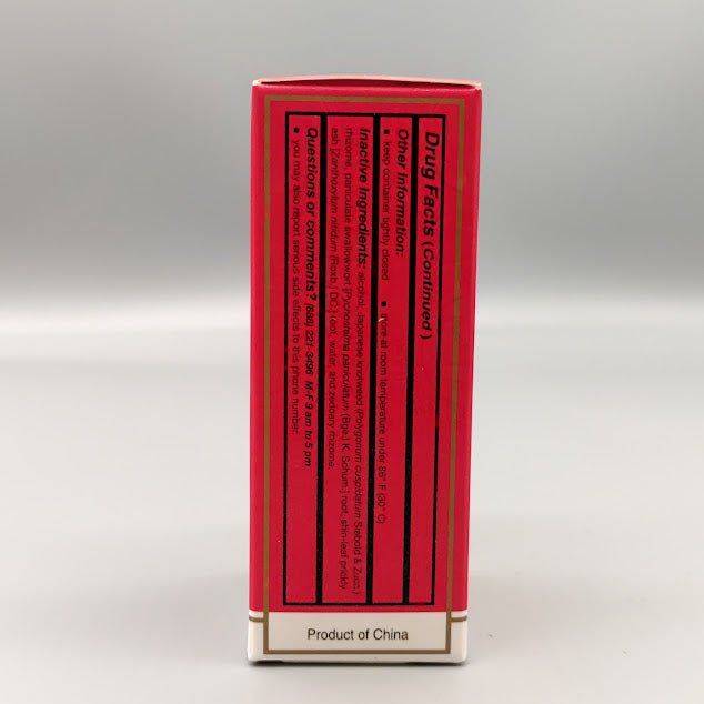 Zheng Gu Shui Topical Pain Relief Herbal Liquid 1 oz de Solstice Medicine Company — vista posterior (foto de archivo)