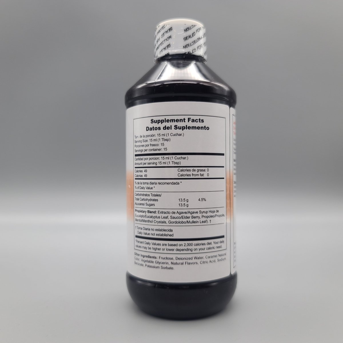 Bronkoplex de Dr. Norman's, jarabe de miel de agave con eucalipto de 8 oz para la tos — vista posterior del envase (foto de archivo)